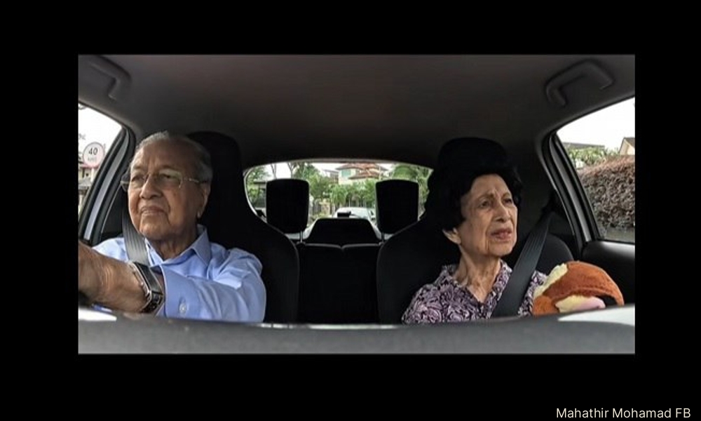 Hold the wheel! Dr M takes Siti Hasmah for a drive in 'Apa 100'