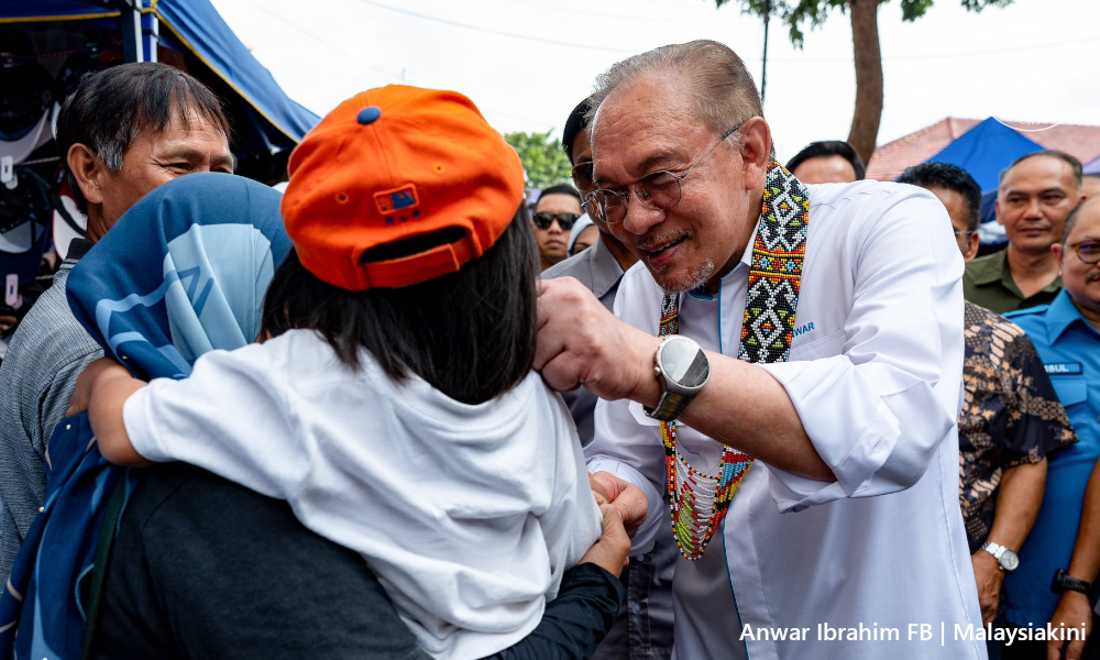 Quizzed on the street, PM rejects distinction over Sabah 40pct entitlement