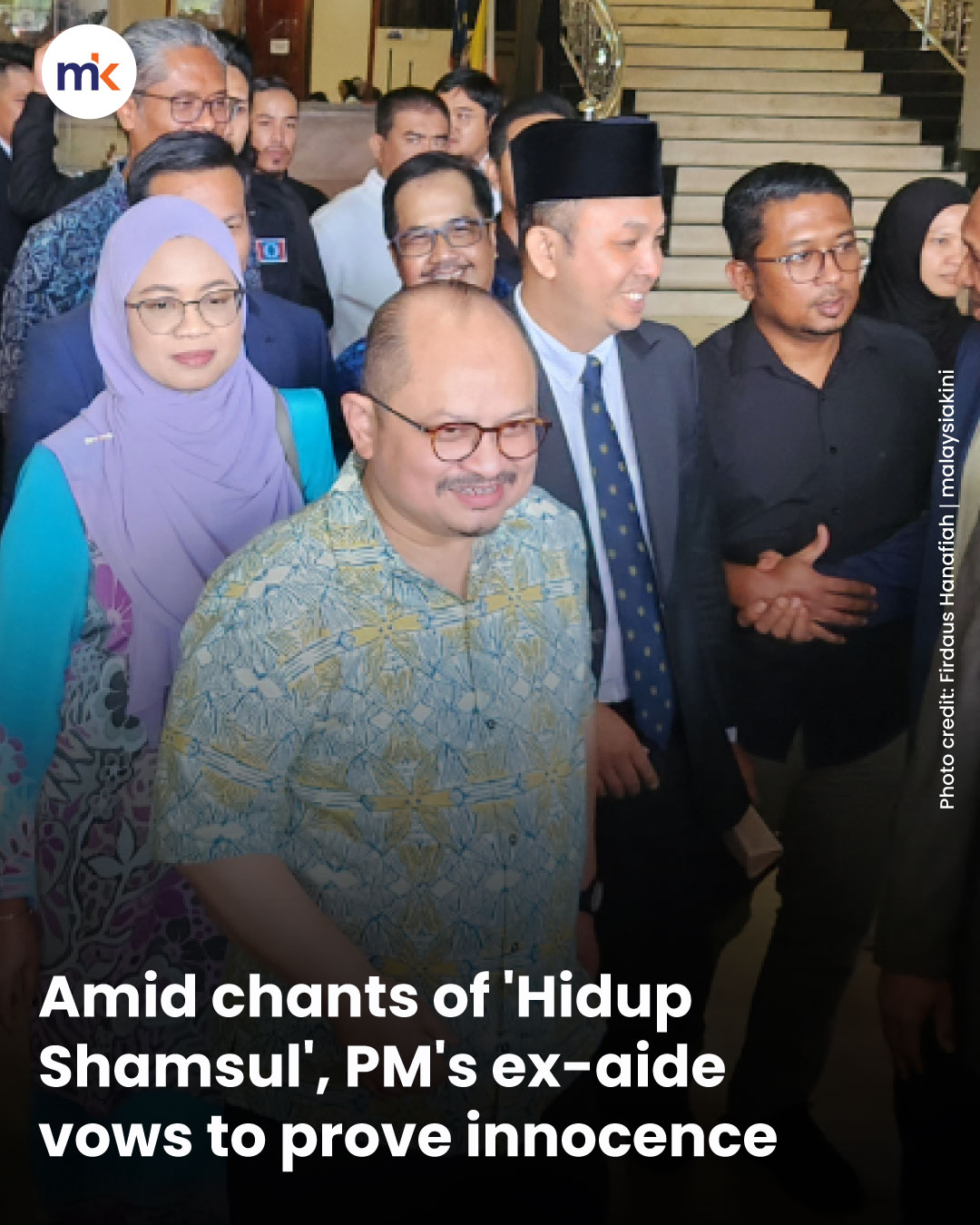 Amid chants of 'Hidup Shamsul', PM's ex-aide vows to prove innocence