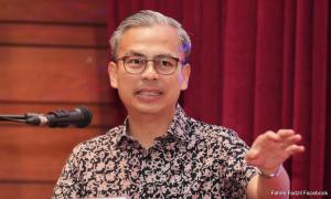 SNAPSHOT | Fahmi urges J-Kom chief to speak carefully; multi-faith group wants poster probed