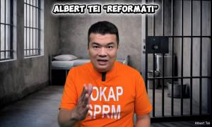 Albert launches YouTube channel, sports MACC orange lockup shirt