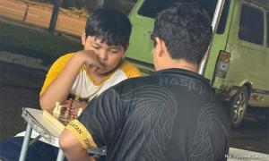 Mum's gambit: Autistic boy gains confidence through street chess