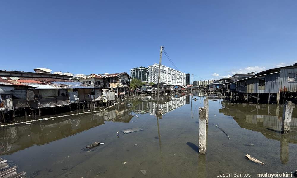 Colonial-era village in KK braces as concrete jungle closes in