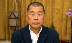 Hong Kong media tycoon gets 20 years jail, journalists also imprisoned